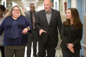 Staff gives President Mulgrew a tour of the building.
