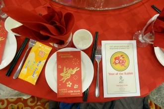 A picture of a menu and program for a Lunar New Year celebration 
