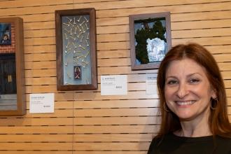 Jennifer Saftler of Brooklyn Brownstone School stands alongside her pieces at at the New York City Art Teachers Association/UFT’s Dreams Art Show on May 10, 2024.