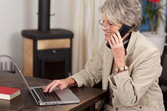 Generic Female pensioner using laptop