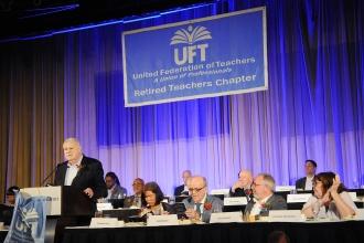Retired Teachers Chapter Leader Tom Murphy addresses the crowd at the 2024 UFT Retired Teachers Chapter Luncheon. 