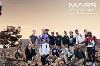Students from Kingsbridge International HS “arrive” on Mars in this photo composite with NASA’s Perseverance rover.