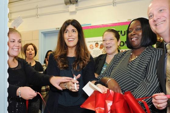 Cutting the ribbon on the new Teacher Center at CS 300 in the Bronx